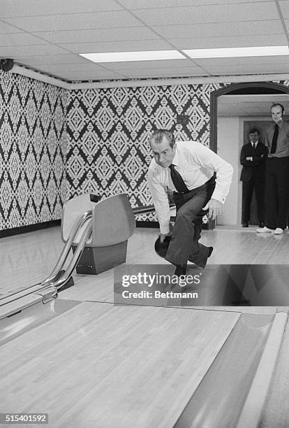 Washington: President Nixon approaches the foul line and is about to let the ball go 9/17 on the alley in the Executive Office Building next to the...