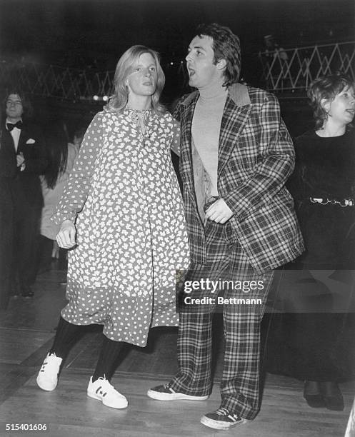 Putting a little fun in their lives...Former Beatle Paul McCartney and his wife, Linda, dance at the Empire Ballroom in Leicester Square, November...