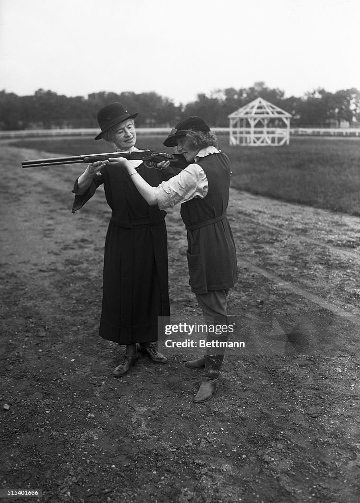 Annie Oakley Instructing Colleague How to Shoot