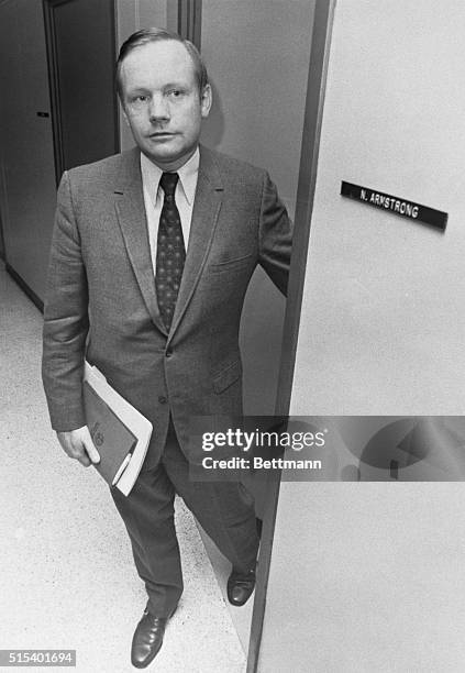 Cincinnati, Oh.: Neil Armstrong, the first man on the moon, steps from his office on the University of Cincinnati campus for his first day as a...
