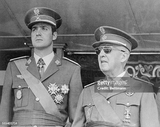 Prince of Spain, Juan Carlos Alfonso Victor Maria De Borbon Y Borbon , stands with General Francisco Franco . | Location: Madrid, Spain.