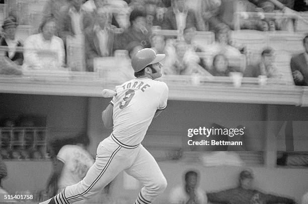 In town for the final game of the '71 season against the New York Mets, September 30th, St. Louis Cardinal's Joe Torre swings a king sized bat...