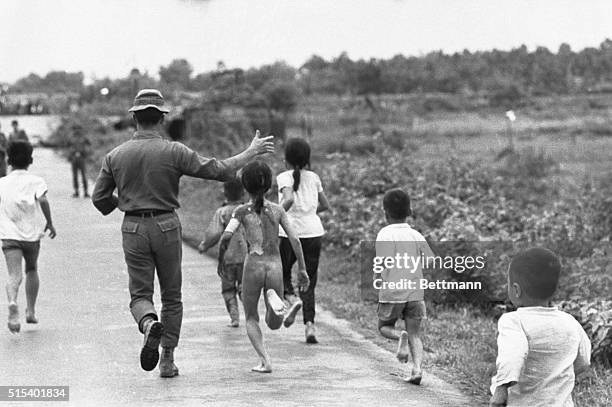 Trang Bang, South Vietnam-ORIGINAL CAPTION READS: Vietnamese Children running after accidental napalm attack against this village by government...