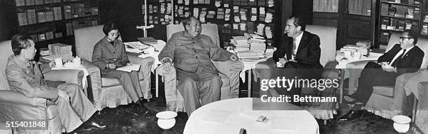 Peking, China- President Richard M. Nixon confers with Chinese Communist Party Chairman Mao Tse-tung . Others at the historic meeting included :...