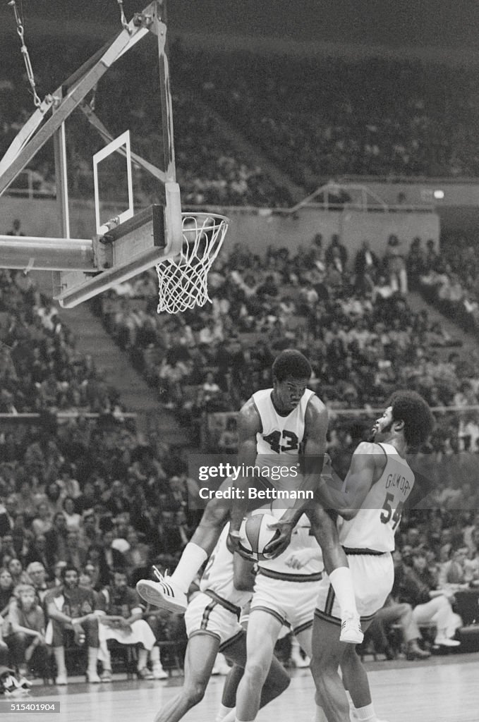 Ralph Simpson Leaping High for the Ball