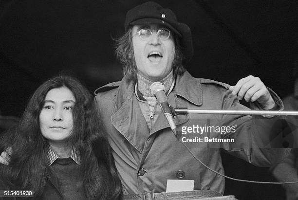 Former Beatle John Lennon and wife Yoko Ono address an antiwar rally in Manhattan's Bryant Park, 22nd April 1972. Over 50,000 people attended the...