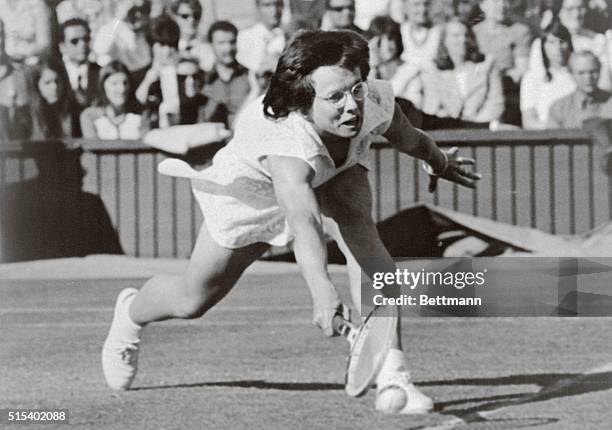 Three-time Wimbledon champion Billie Jean King stretches for a low return during her match against fellow American Sharon Walsh at the 1972 Wimbledon...