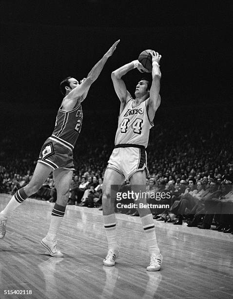 Inglewood, Calif.: Chicago Bulls Clifford Ray moves in to cover Wilt Chamberlain of the Los Angeles Lakers as Chamberlain bides his time before...