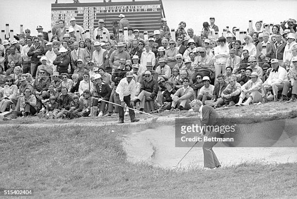Pebble Beach, Calif.: Tightly packed gallery looks on as Jack Nicklaus comes out of bunker on 8th hole during 3rd round action in the U.S. Open Golf...