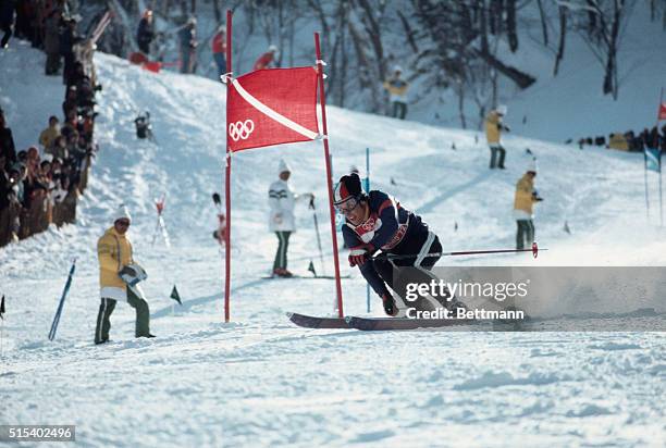 Sapporo, Japan: Italy's Gustavo Thoeni, present holder of the World Cup, swings around a gate en route to his gold medal victory in the XI Winter...