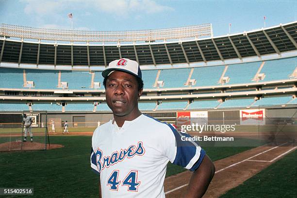 This is a waist-up portrait of Hank Aaron of the Atlanta Braves baseball team in uniform.