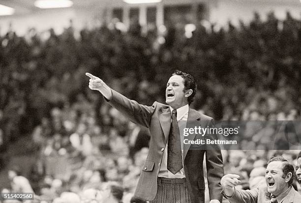 Dayton, O.: Marquette University head coach Al McGuire yells to his players during 2nd period action of game with University of Kentucky. Kentucky...