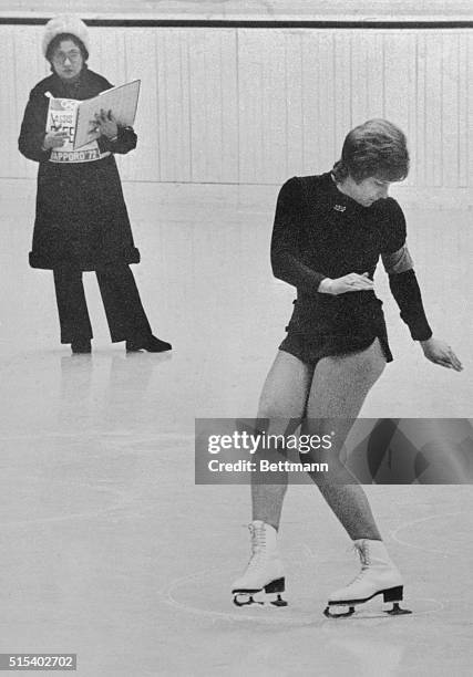 World champion Beatrix Schuba of Austria strengthens her lead in the quest of the Olympic women's figure skating title as she performs compulsory...