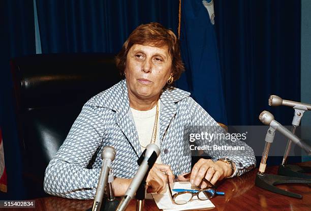 Close-up of Mrs. Ella T. Grasso, Governor of Connecticut, in her office. Slide shows her seated behind her desk. Undated color slide.