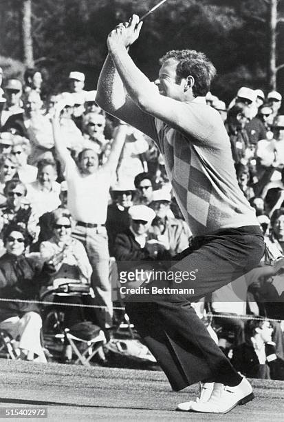 Augusta, Georgia: A fan in the gallery leaps to his feet as elated Tom Weiskopf goes 9-under-par with a birdie on the 18th green, taking the third...