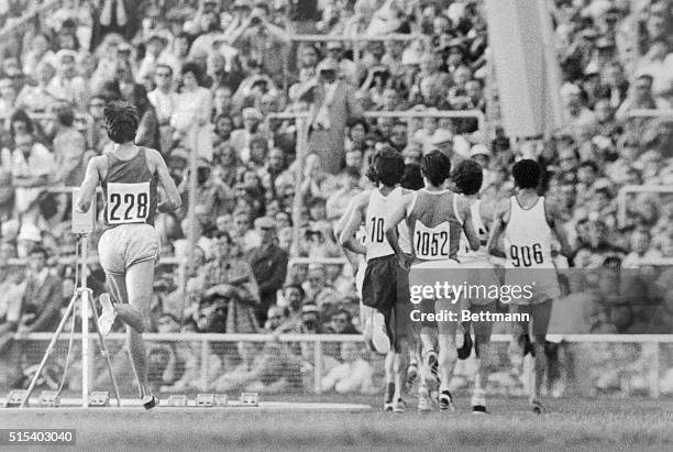 It seems an impossible task as Finland's Lasse Viren chases the pack after taking a spill during the running of the Olympic 10,000-meter final for...