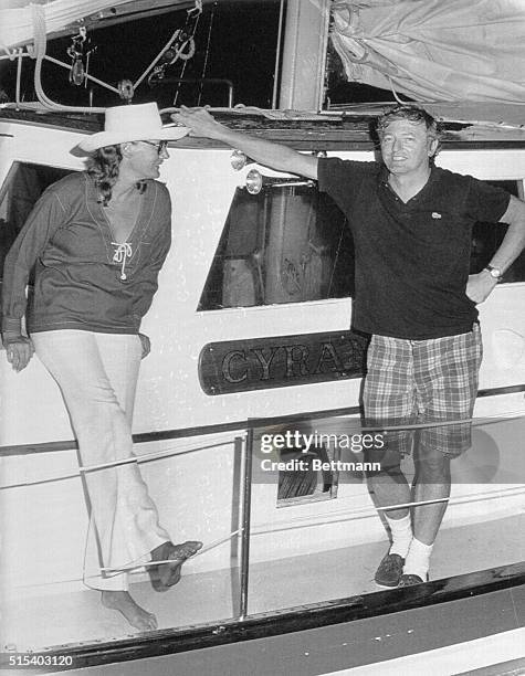 Conservative columnist William F. Buckley, Jr., and his wife, Patricia, wait on the deck of their 75-foot sloop Cyrano as the Coast Guard docks the...