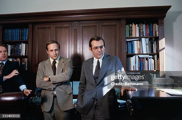 Donald Rumsfeld fingers his "stand-up" desk in White House office 11/6 as he talks with his successor as White House Chief of Staff, Richard B....