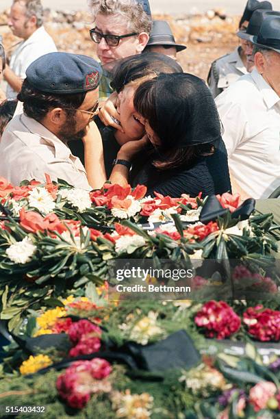 Tel Aviv, Israel: Bodies of Olympic Atheletes killed in terrorist attack Sept. 5th,1972 in Munich lie on commamd cars following thier arrival here...