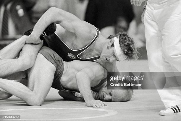 Munich, Germay: American wrestler Dan Gable of Waterloo, Iowa, grapples with West Germany's Klaus Rost in a match that ended with Rost's defeat,...