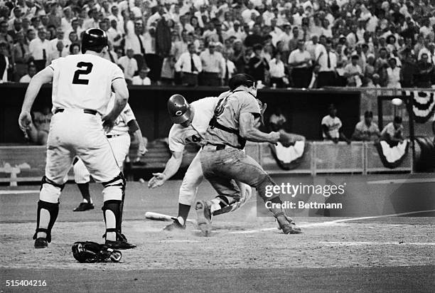 Boston: World Series-1st Game. Luis Tiant the base runner--as he slides safely into 2nd in the 7th inning when Dwight Evans was safe on first by a...