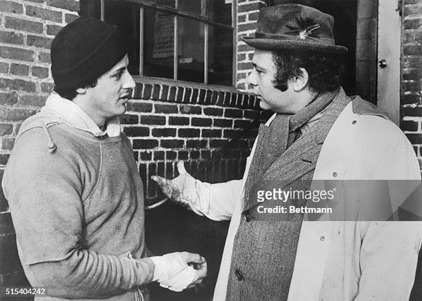 Rocky, Sylvester Stallone, at left, discusses his forthcoming match for the world championship with his best friend Paulie, , in a scene from Rocky,...