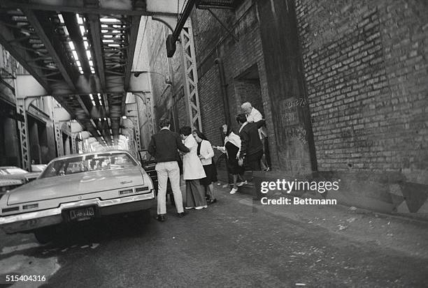 Miss Rosemary Kennedy, the 56-year-old mentally retarded sister of the late President John F. Kennedy, accompanied by a policeman and nuns, walks to...