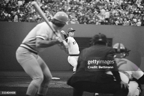 Boston: Red Sox pitcher Bill Lee winds up and lets go with the first pitch of second game of the World Series to Pete Rose of the Cincinnati Reds for...