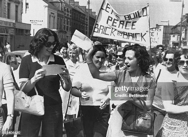 Ireland: Leaders of the "Women for Peace" rally by Protestants and Catholics here show Mrs. Betty Williams, , and Miss Mairead Corrigan, with others...