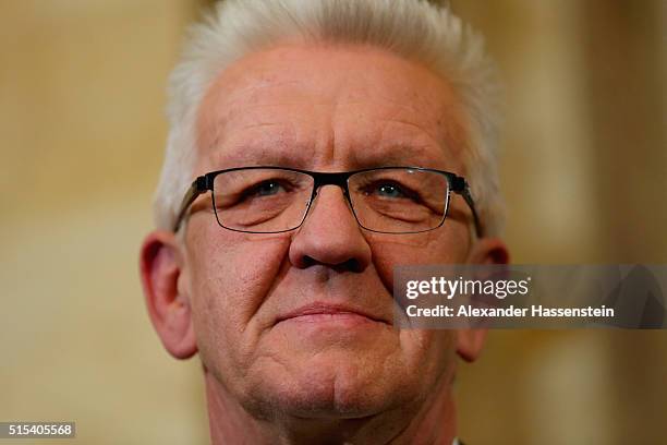 Winfried Kretschmann, incumbent governor of Baden-Wuerttemberg and member of the German Greens Party looks on during a press conference on election...