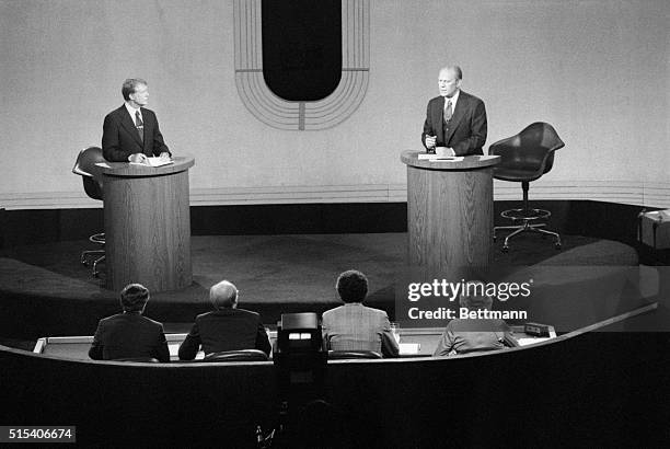 Democratic presidential nominee Jimmy Carter and President Jerry Ford, shown before panel during second debate at San Francisco's Palace of Fine...