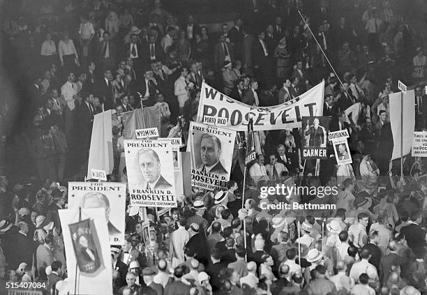 Delegates from North Dakota, Wyoming, Porto Rico, and other states hold up signs of New York Governor Franklin Delano Roosevelt following his...