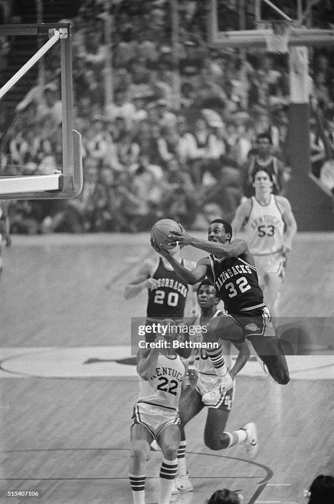 Sidney Moncrief with Basketball in Mid Air