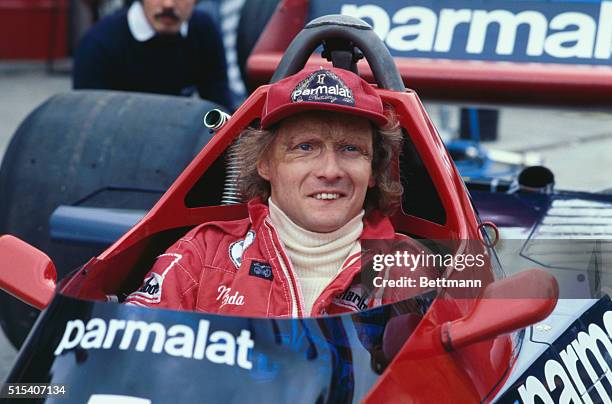 Racecar driver Niki Lauda shown here in pits.