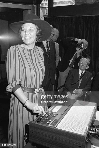 New York: Crown Princess Beatrix of the Netherlands presses a button to start a videotaped message from the Mayor of Amsterdam Wim Polack to Mayor...