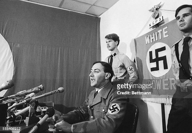 Nazi leader Frank Collin, flanked by members of the National Socialist Party of America, announces at a news conference suburb of Skokie. Collin...