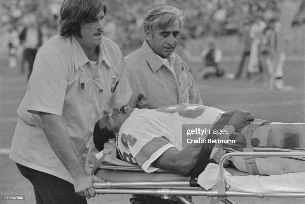Darryl Stingley Lying on Stretcher During Football Game
