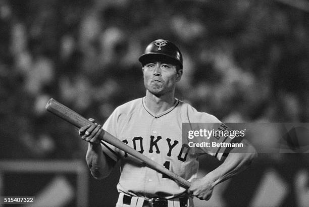 Japan's home run king, Sadaharu Oh of the Yomiuri Giants, grabs his bat to go in to the batter box during Giants-Yakult Swallows game here 8/27. Oh,...