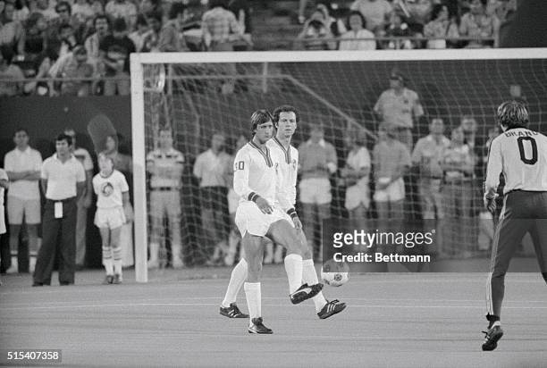 East Rutherford, New Jersey: Two of soccer's greatest stars Johan Cruyff of Holland, and Franz Beckenbauer , from West Germany, take a little...