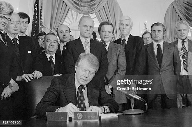 Washington: At a ceremony in the White House, Pres. Carter signs the Nuclear-Non proliferation Act, saying it takes a "major step forward" in...