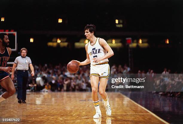 Pete Maravich, of the New Orleans Jazz is shown here dribbling the ball in action against the New York Knicks.