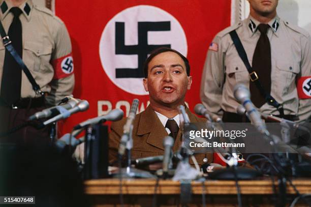 Nazi leader Frank Collin makes announcement at a news conference 6/22 that he is calling off his band's march in the heavily Jewish suburb of Skokie...