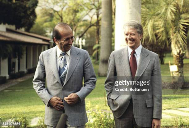 Caracas, Venezuela: President Carter and President Carlos Perez of Venezuela leave the presidential palace after bilateral talks 3/28.