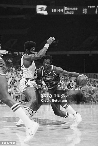 Denver's David Thompson drives past jazz's Nate Williams during 1st quarter action in the Superdome 4/10. Thompson went a bit too far, however, and...