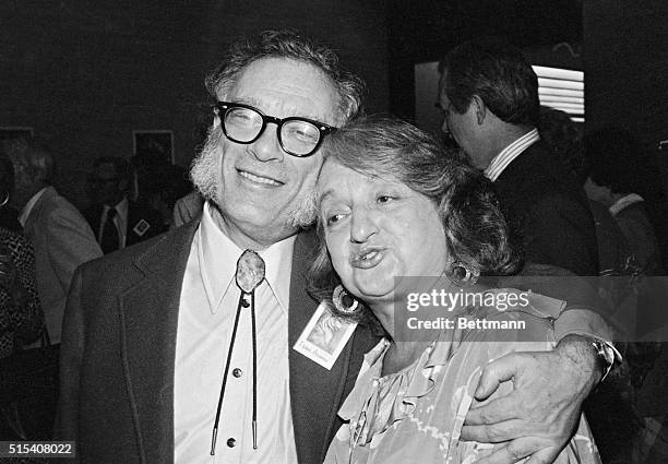 New York: Authors Isaac Asimov and Betty Friedan get together 5/18 during 30th anniversary celebration of the American Society of Journalists and...