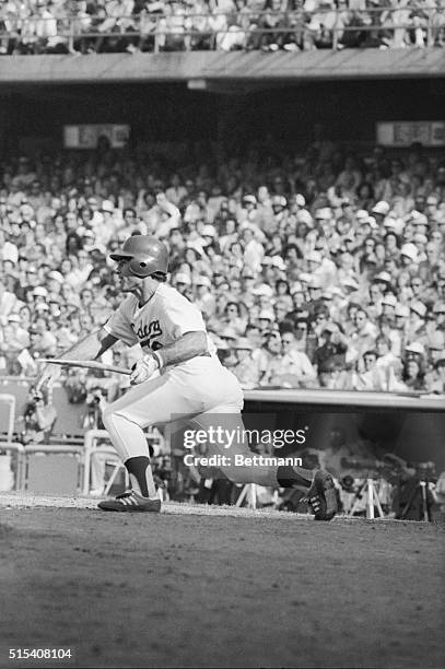 Los Angeles Dodgers Steve Garvey is left with nothing but the handle of his bat as he singles to shortstop in the seventh inning of game four of the...