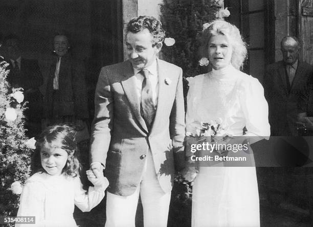 Actress Candice Bergen and French movie director Louis Malle after their wedding in the small village of Lugagnac. Malle holds hand of this daughter...