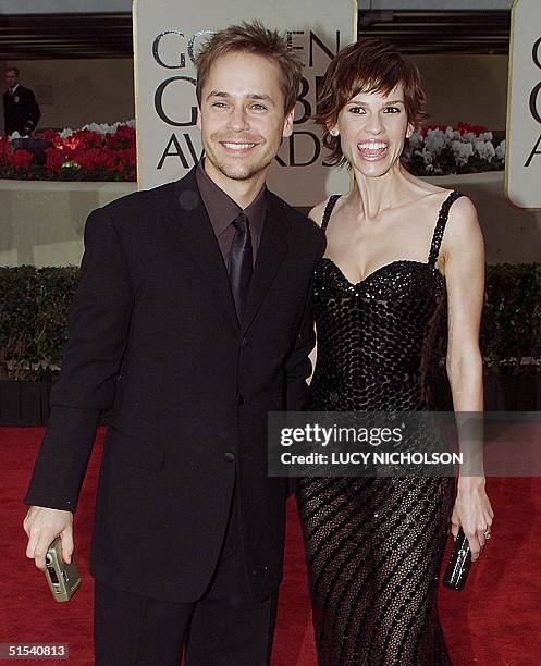 Actress Hilary Swank arrives with Chad Lowe for the 57th Annual Golden Globe Awards in Beverly Hills 23 January, 2000. Swank is nominated for Best...