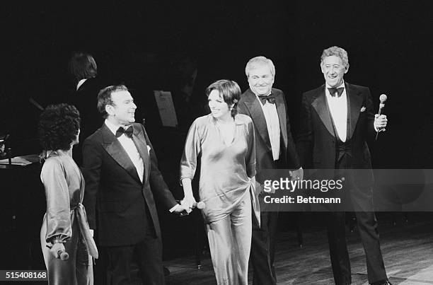 November 12, 1978 - New York: Liza Minnelli is flanked by composer John Kander and lyricist Fred Ebb during tribute to the duo at Avery Fisher Hall....