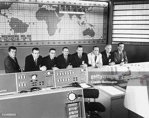 Cape Canaveral, Florida- This photo from NASA files shows the U.S.'s seven astronauts posing in the Mercury Control Center with Christopher R. Craft...